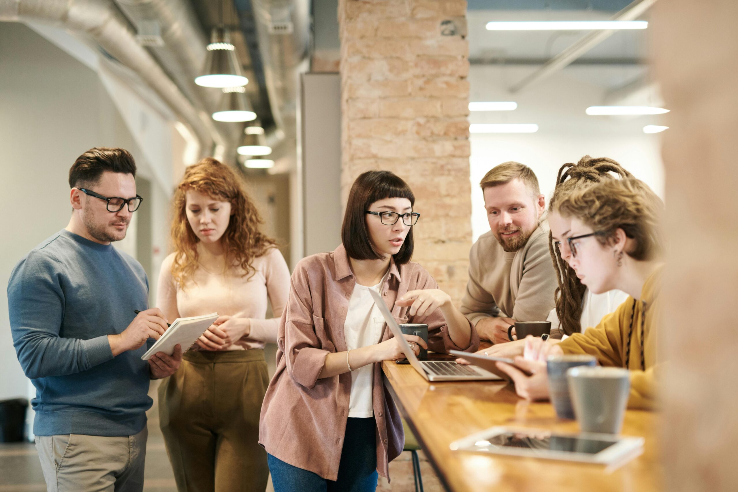 Employees working around a table