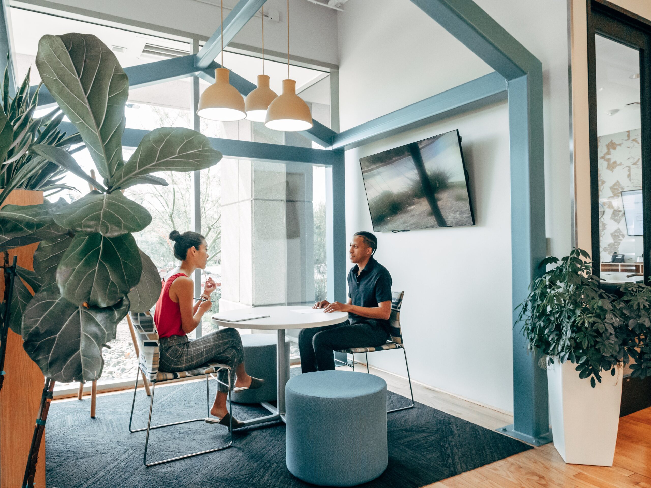 Two people sitting at a desk